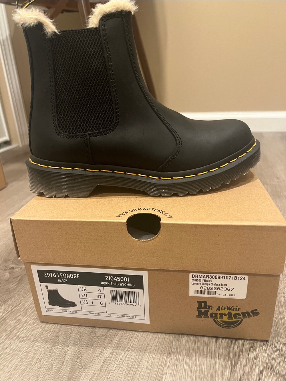 Dr. Martens women’s 2976 Leonore Black Chelsea Boots with Faux Fur